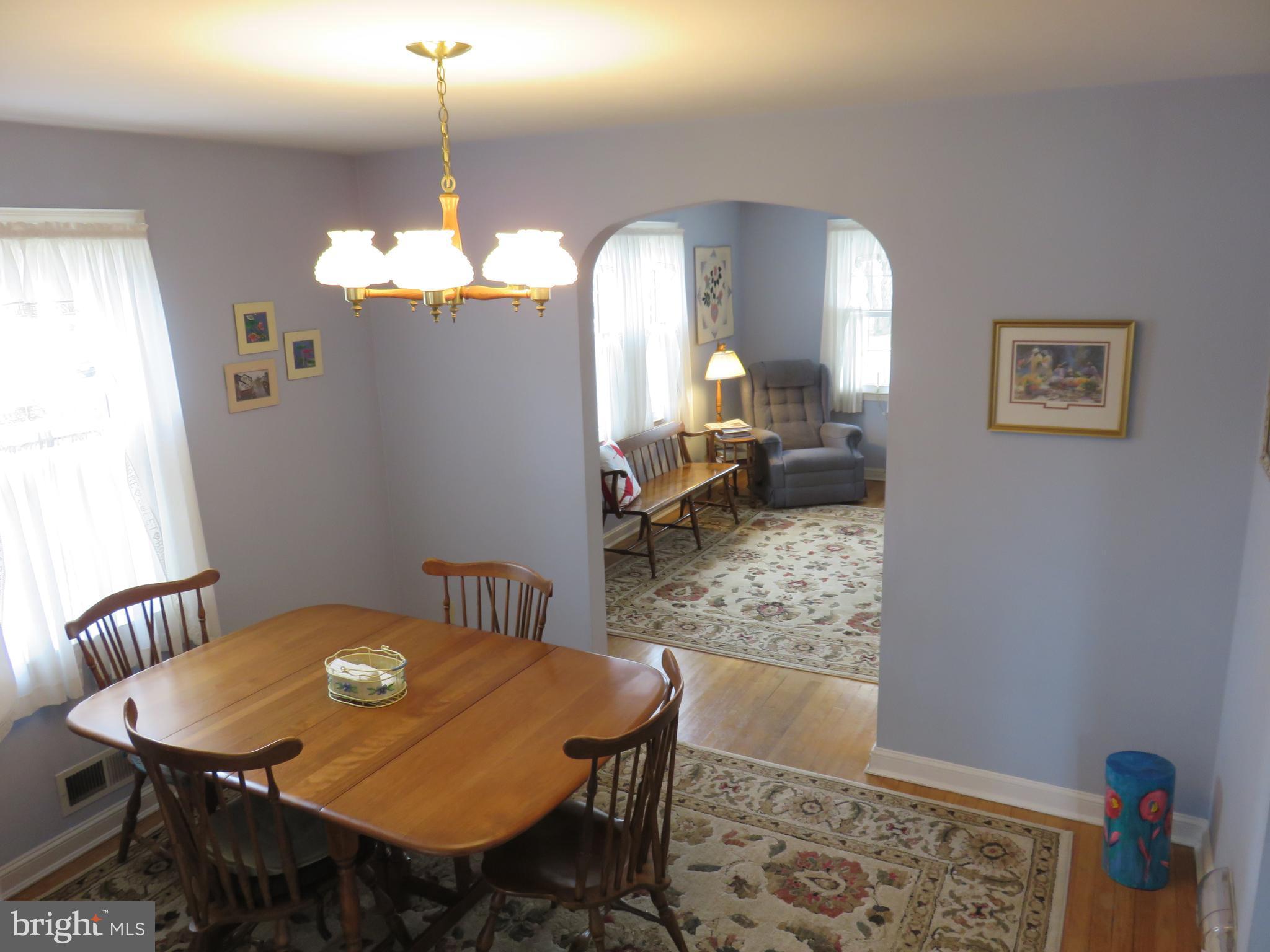 1804 Forrest Road Baltimore, MD 21234 - Photo 25 of 25 a view of a dining room with furniture and wooden floor