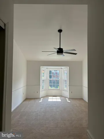 a view of an empty room with window
