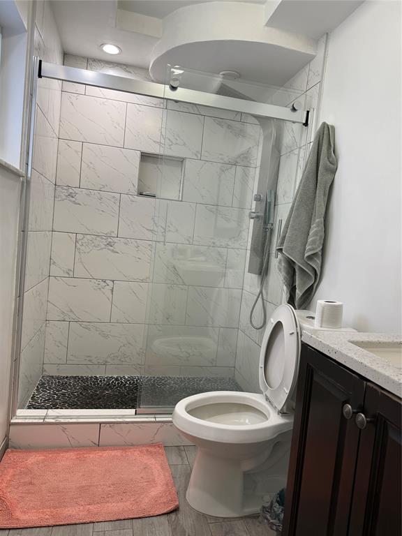 8121 Southwest 8th Street North Lauderdale, FL 33068 - Photo 7 of 16 a bathroom with a toilet and shower