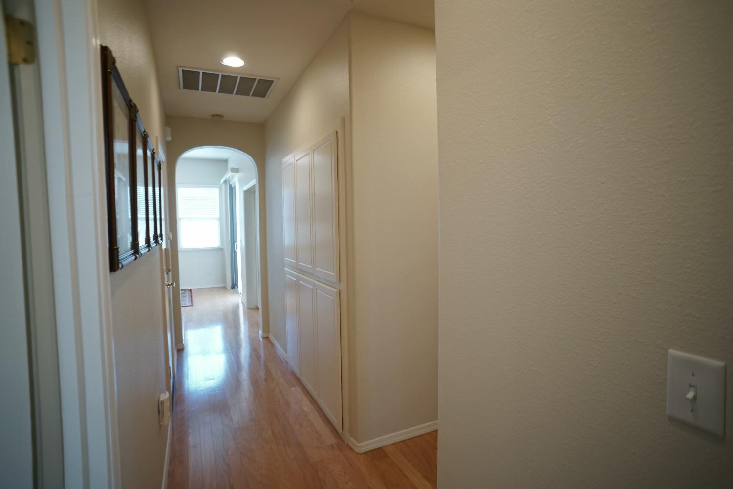 618 West Lisbon Lane Clovis, CA 93619 - Photo 20 of 26 a view of hallway with wooden floor