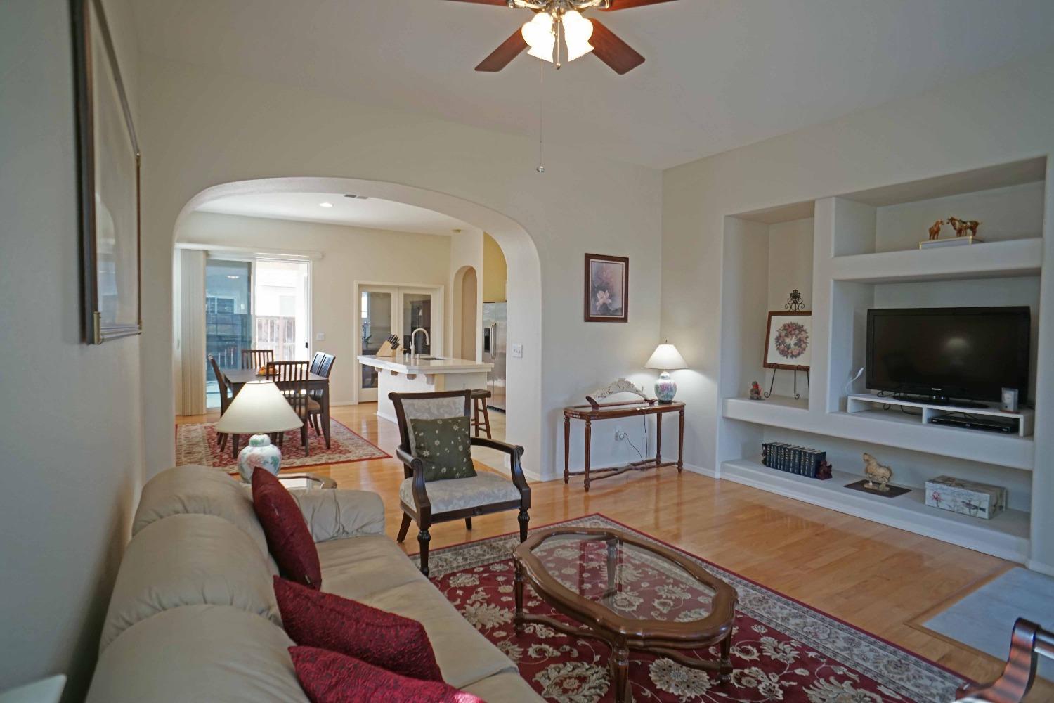 618 West Lisbon Lane Clovis, CA 93619 - Photo 3 of 26 a living room with furniture and a flat screen tv