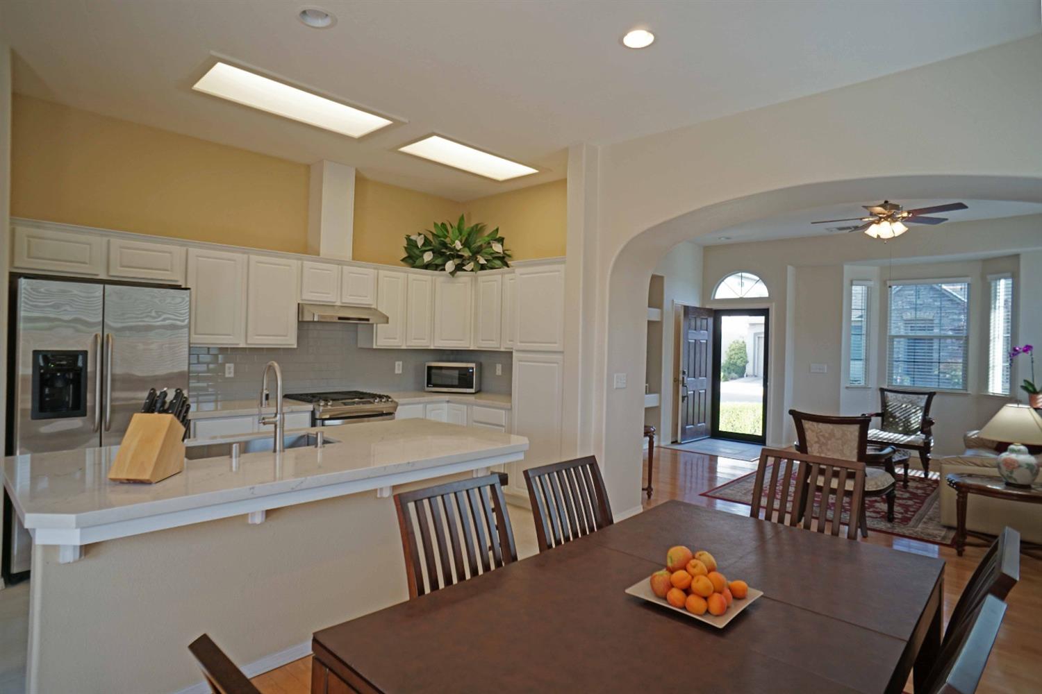 618 West Lisbon Lane Clovis, CA 93619 - Photo 7 of 26 a view of a dining room with furniture