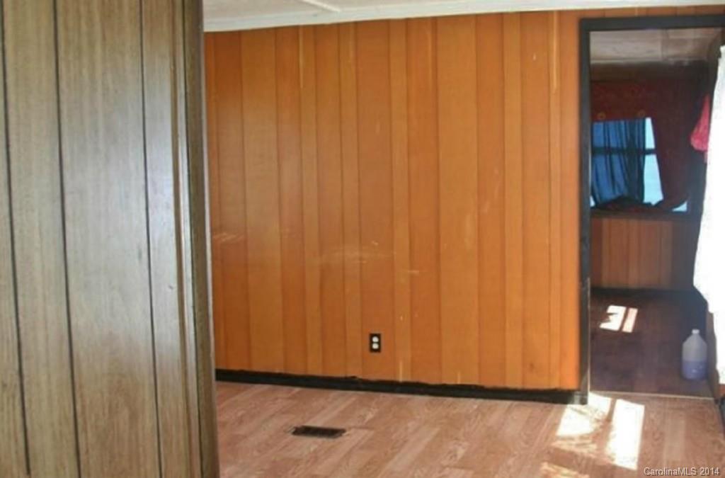 873 Wilmoth Road Clover, SC 29710 - Photo 3 of 7 a view of an empty room and wooden floor