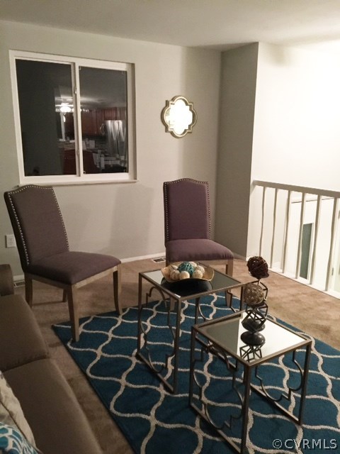 10506 White Rabbit Road Richmond, VA 23235 - Photo 12 of 27 a view of a dining room with furniture and wooden floor