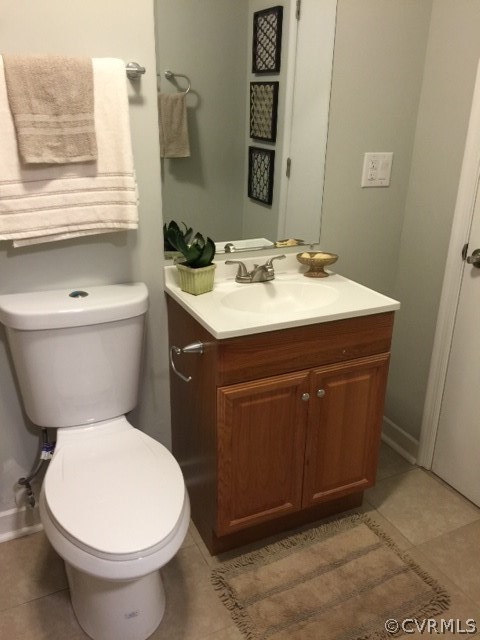 10506 White Rabbit Road Richmond, VA 23235 - Photo 24 of 27 a bathroom with a sink and a mirror