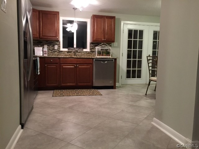 10506 White Rabbit Road Richmond, VA 23235 - Photo 6 of 27 a kitchen with stainless steel appliances granite countertop a stove and a sink