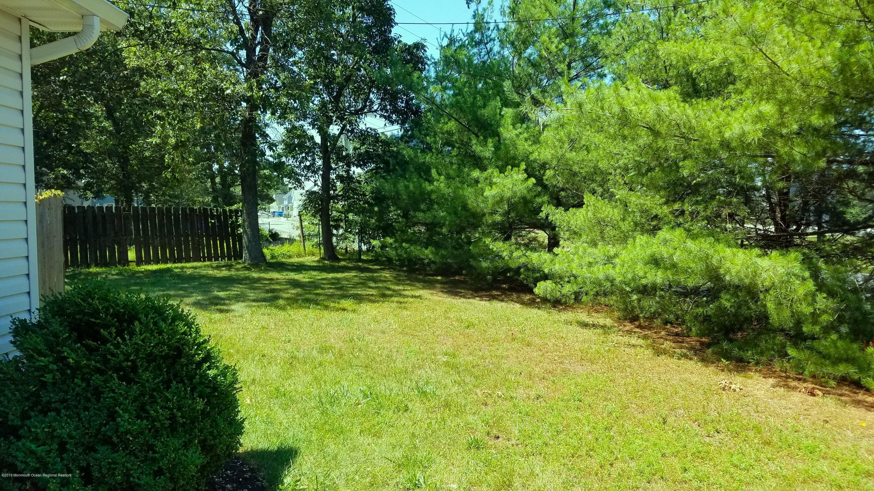 369 Old Squan Road Brick, NJ 08724 - Photo 29 of 30 Side view of back yard