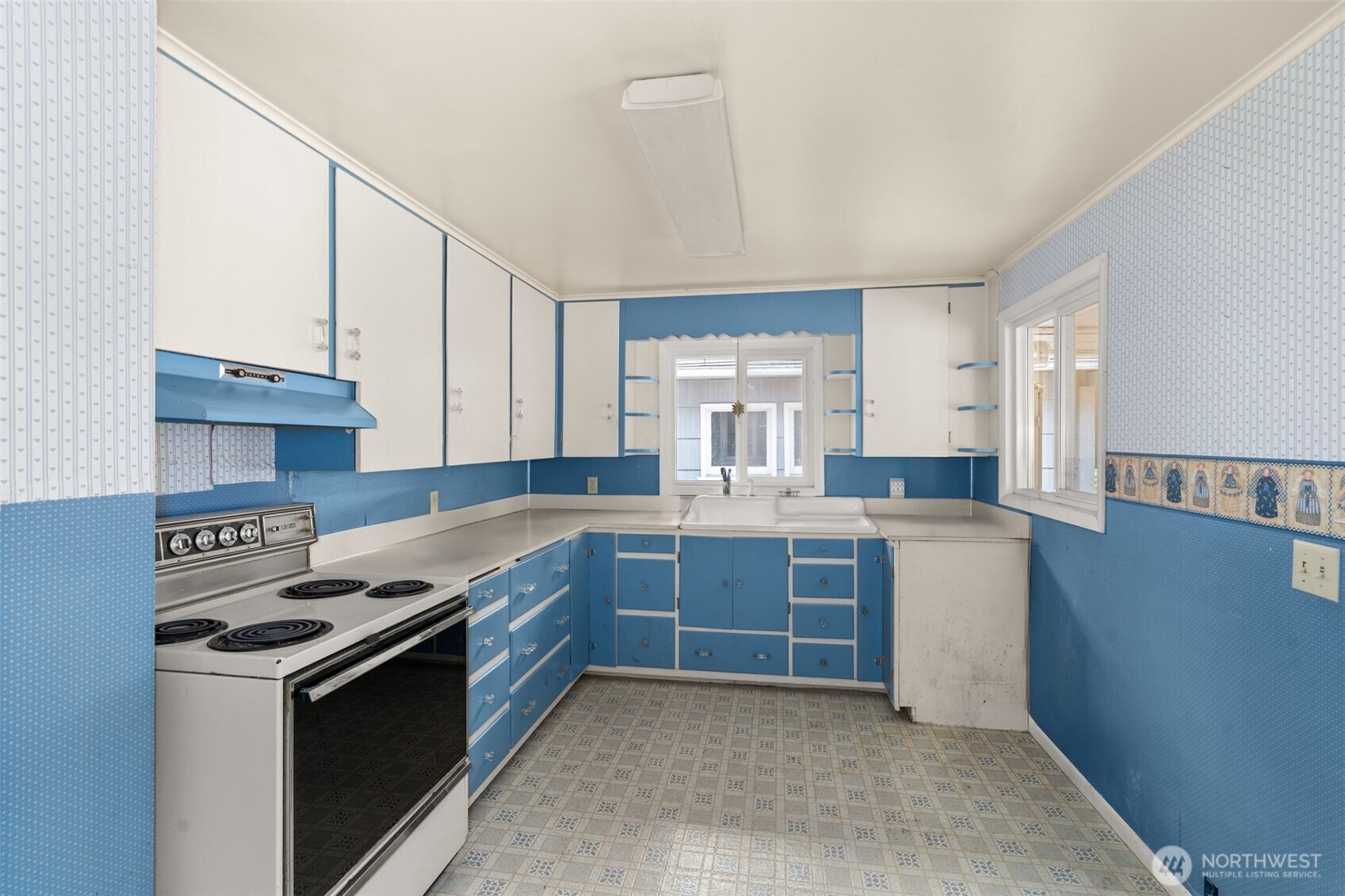 269 Kennedy Road Onalaska, WA 98570 - Photo 14 of 29 a kitchen with stainless steel appliances granite countertop a stove a sink and a refrigerator