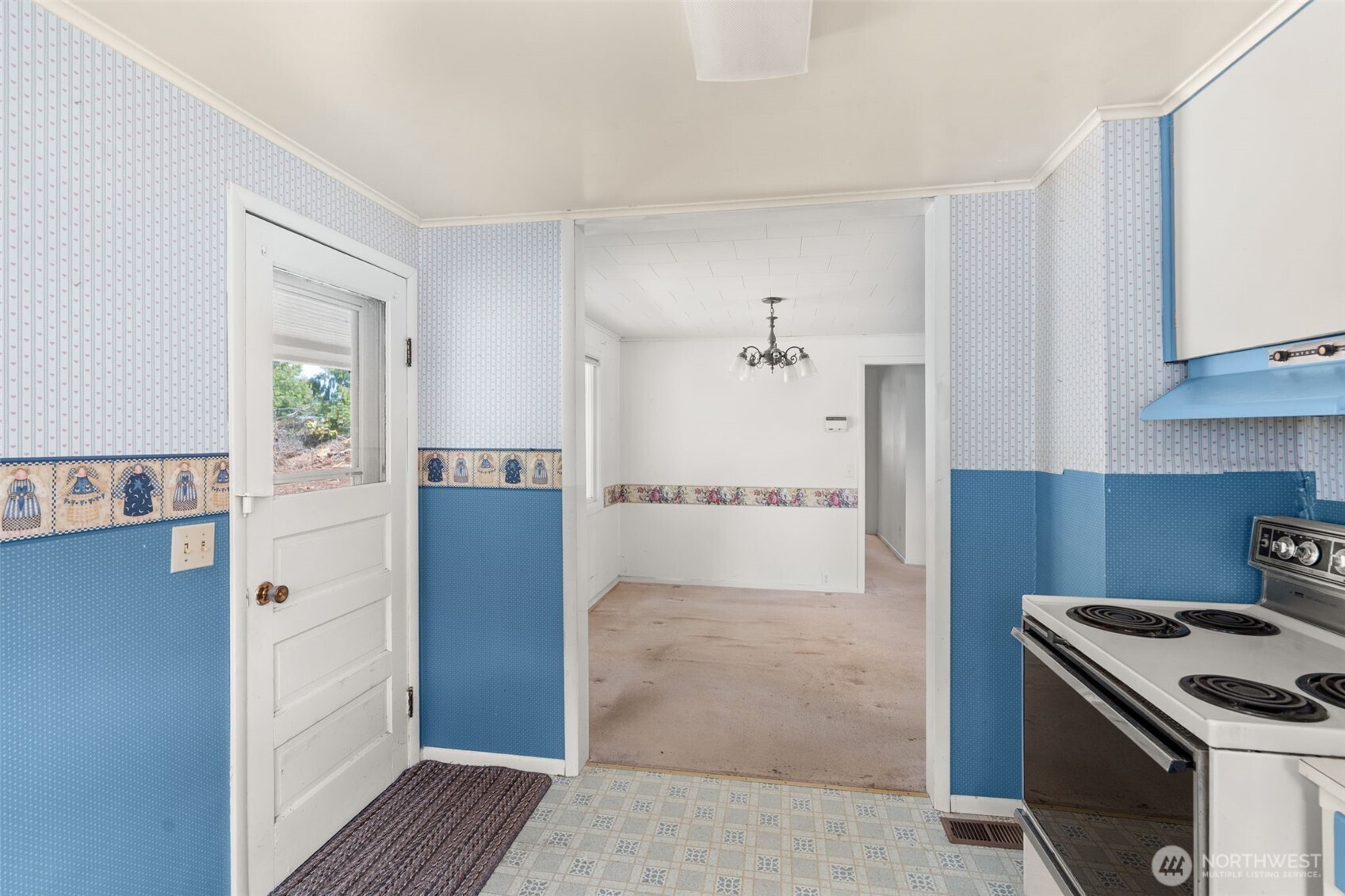 269 Kennedy Road Onalaska, WA 98570 - Photo 15 of 29 a kitchen with a stove and a refrigerator