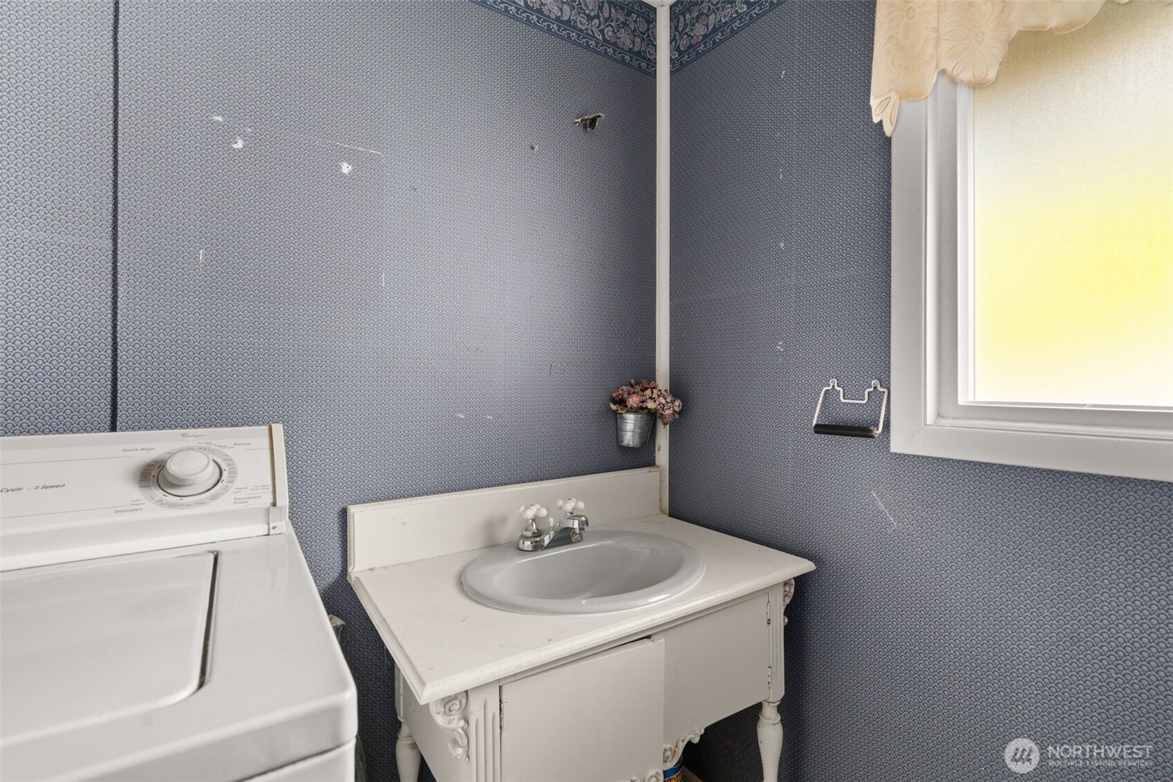 269 Kennedy Road Onalaska, WA 98570 - Photo 19 of 29 a bathroom with a sink a toilet and a window