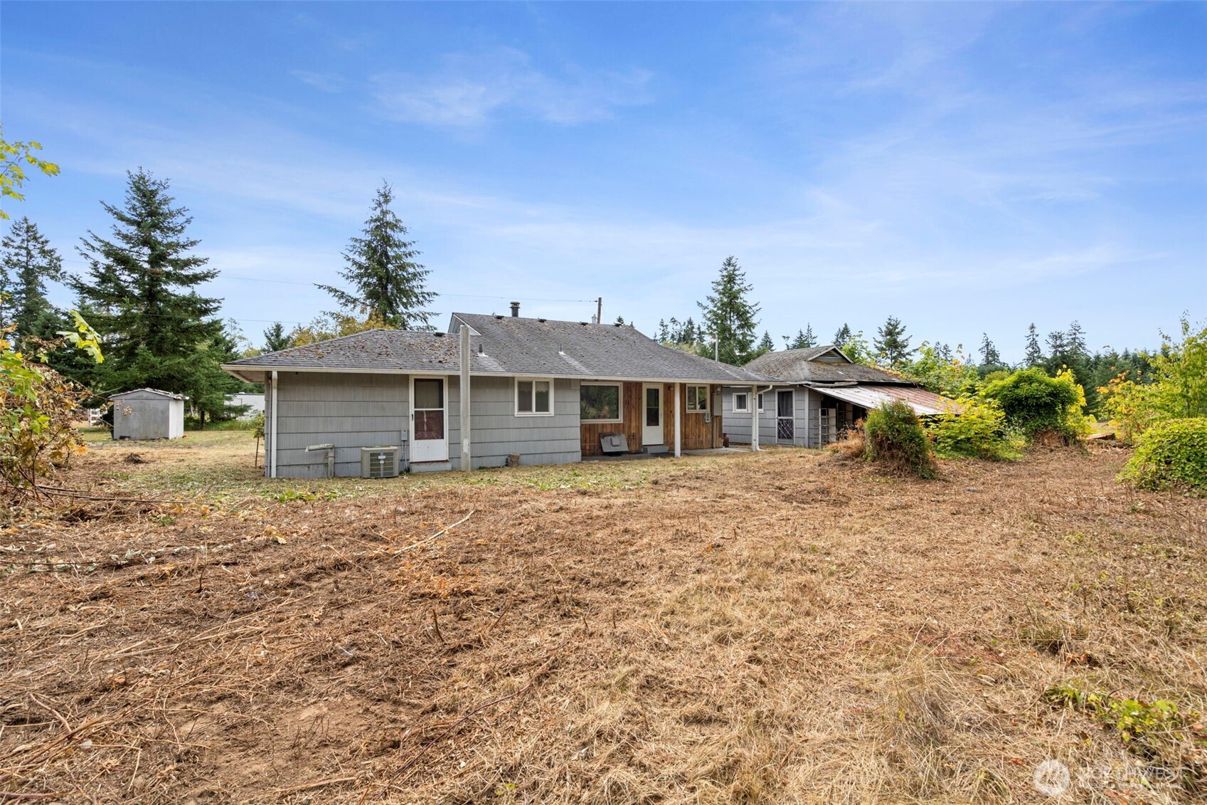 269 Kennedy Road Onalaska, WA 98570 - Photo 21 of 29 a front view of a house with a yard and garage