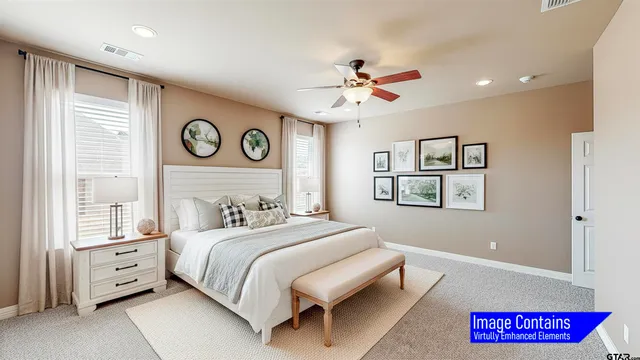 a bedroom with a bed and a large mirror