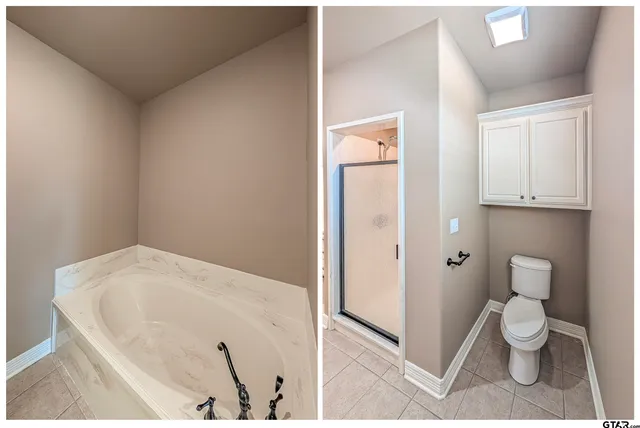 a bathroom with a toilet and a sink