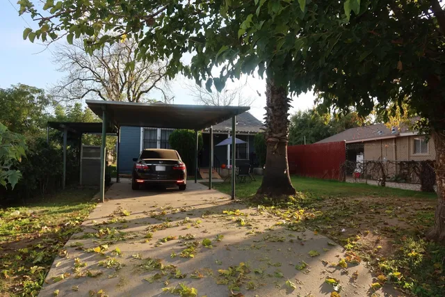 a car parked in front of a house