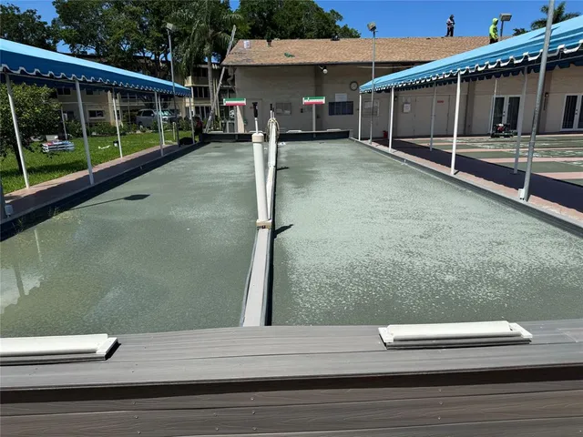 a view of a house and a yard