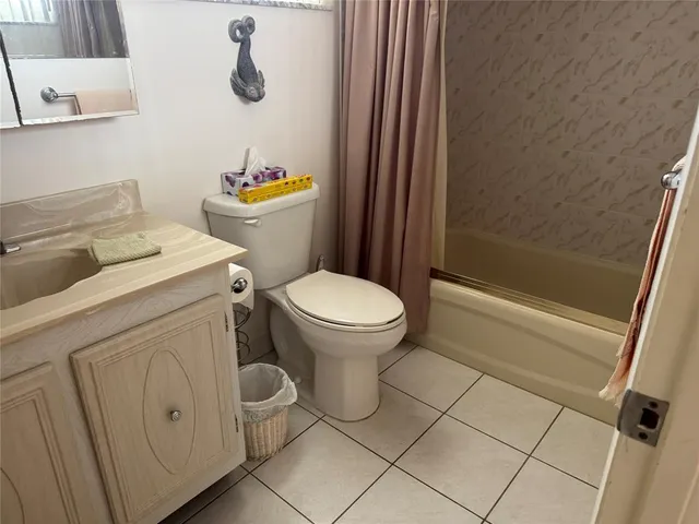 a bathroom with a sink toilet and a bathtub