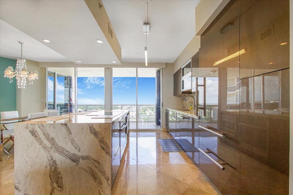 3100 North Ocean Boulevard, Unit 2103 Fort Lauderdale, FL 33308 - Photo 15 of 37 a spacious bathroom with a large tub and shower