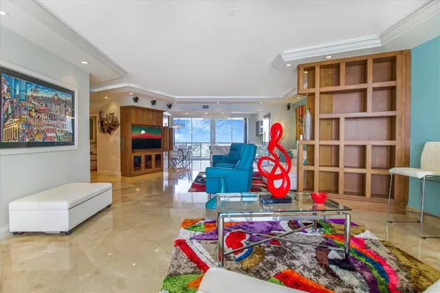 a view of play room with furniture and toys