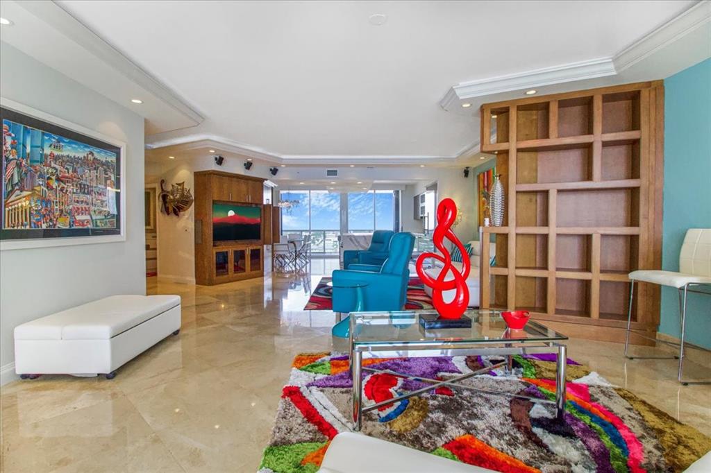 3100 North Ocean Boulevard, Unit 2103 Fort Lauderdale, FL 33308 - Photo 6 of 37 a view of play room with furniture and toys