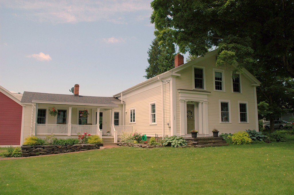 199 Huntington Road Worthington, MA 01098 - Photo 1 of 30 a front view of a house with a yard