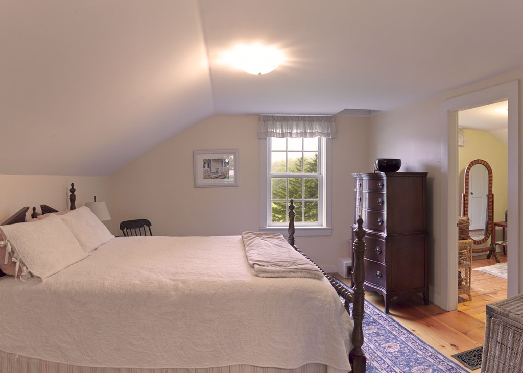 199 Huntington Road Worthington, MA 01098 - Photo 19 of 30 a bedroom with a bed and large windows