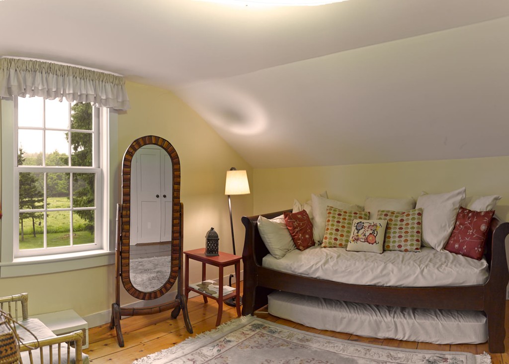 199 Huntington Road Worthington, MA 01098 - Photo 20 of 30 a bedroom with furniture and windows