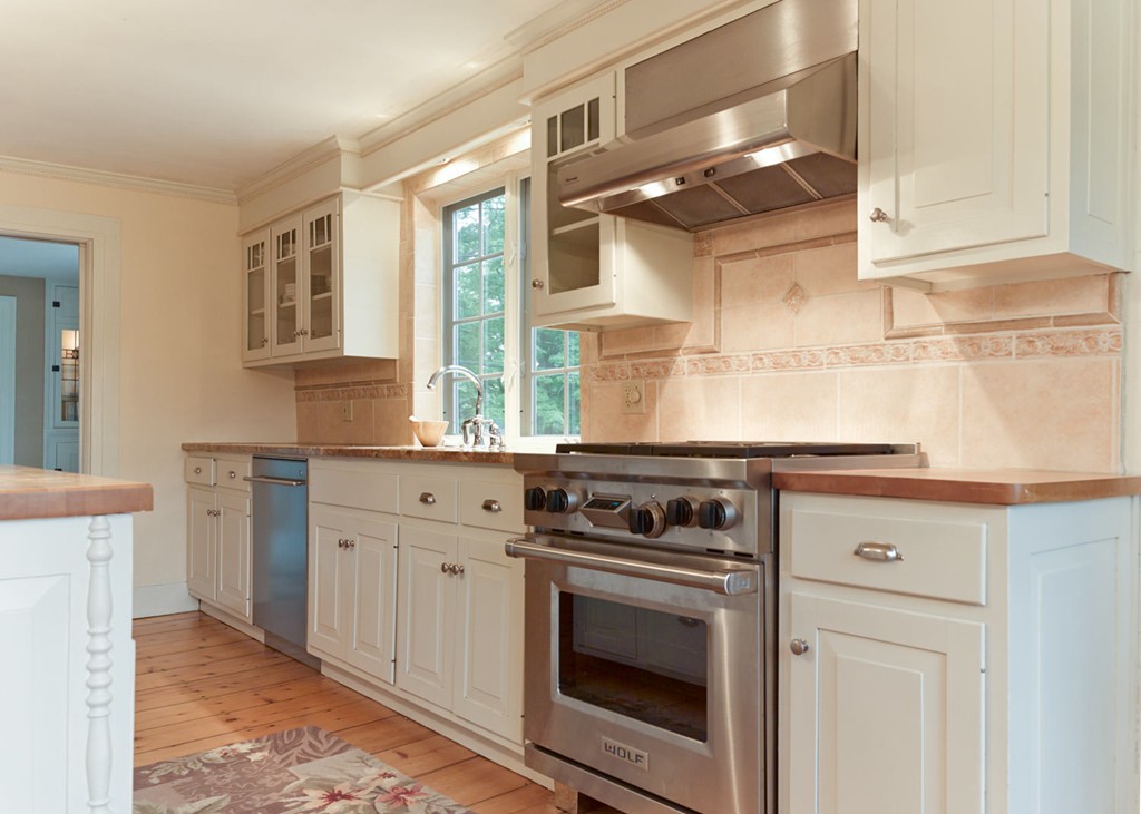 199 Huntington Road Worthington, MA 01098 - Photo 5 of 30 a kitchen with stainless steel appliances granite countertop a stove and a sink