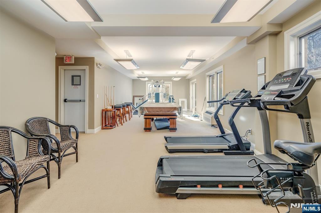 119 Walnut Street, Unit C0010 Montclair, NJ 07042 - Photo 40 of 41 a room with gym equipment and windows