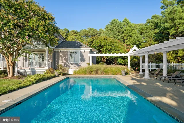 a kitchen with stainless steel appliances granite countertop a stove and a refrigerator