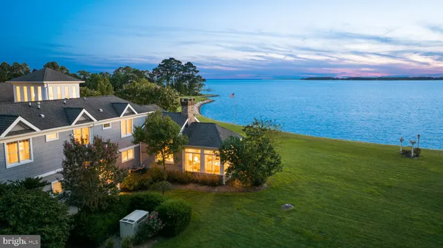 an aerial view of a chairs and table on the terrace