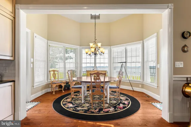 a bathroom with a sink a mirror and a shower