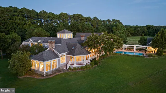 a view of a swimming pool and an ocean