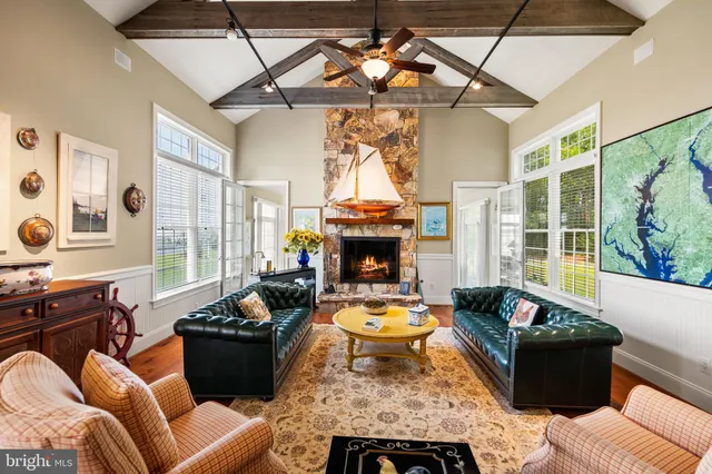 a spacious bedroom with a bed and a large window