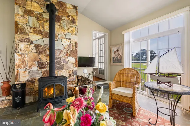 a view of living room with furniture and wooden floor