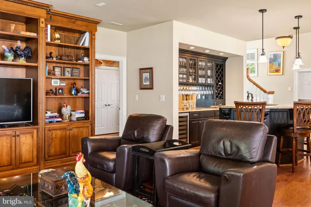 a view of a dry yard with wooden fence