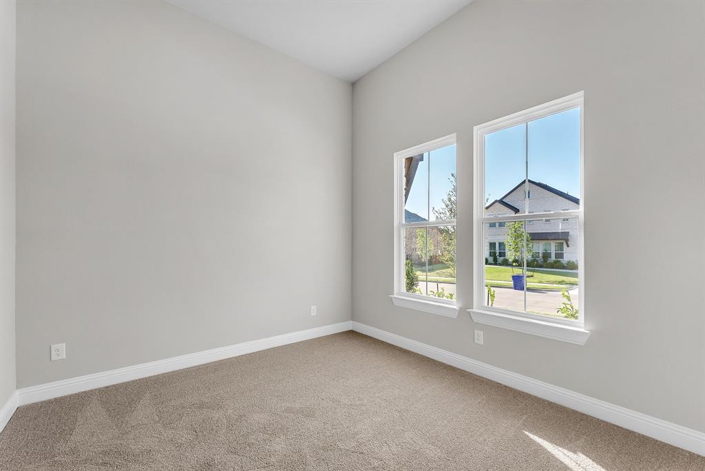 1215 Olive Drive Mansfield, TX 76063 - Photo 20 of 28 an empty room with a window