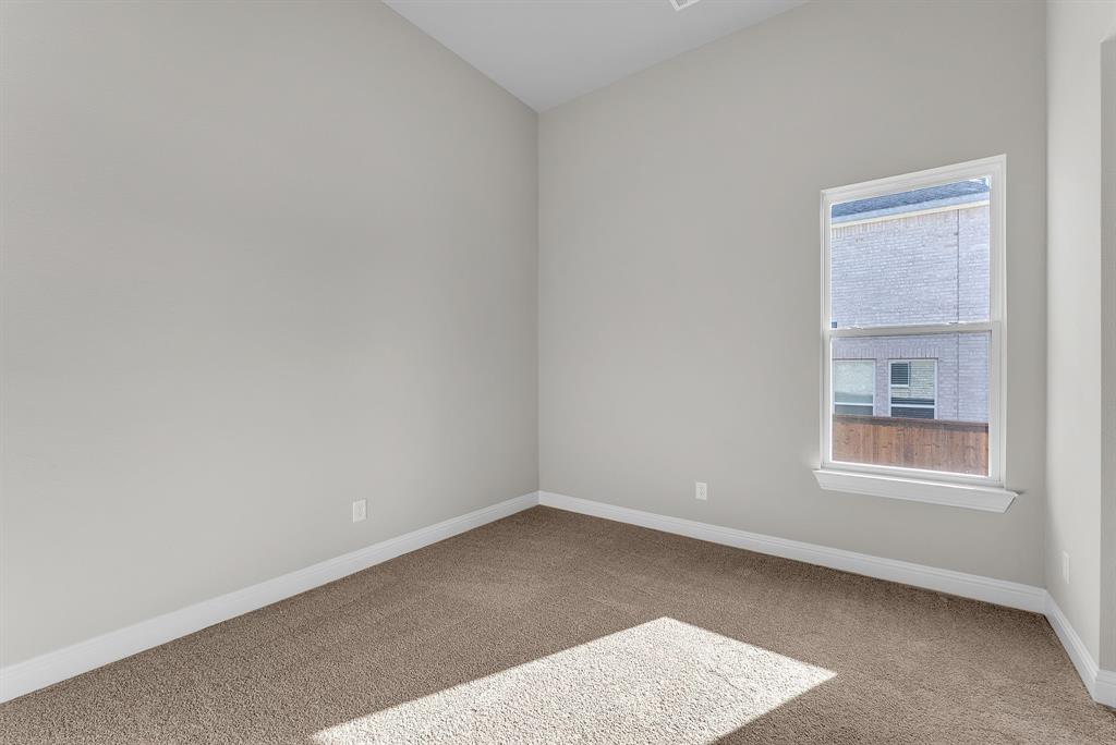 1215 Olive Drive Mansfield, TX 76063 - Photo 22 of 28 an empty room with a window