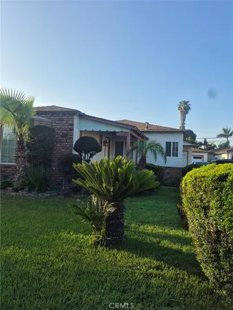 a house view with a garden space