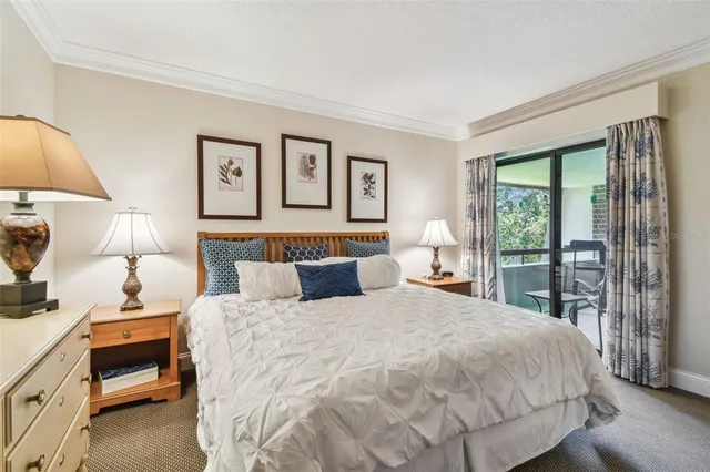 a green field with lots of trees