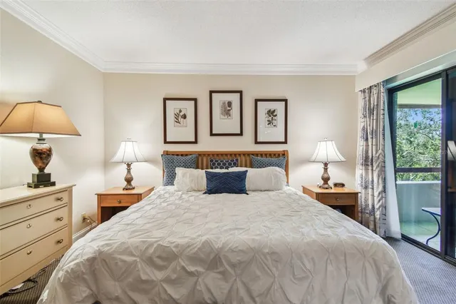 a view of a garden with a bench in the background