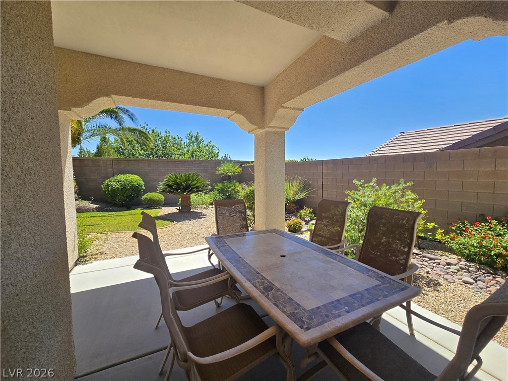 2567 Dirleton Place Henderson, NV 89044 - Photo 61 of 67 A private covered patio and desert landscaping offer a tranquil outdoor retreat.