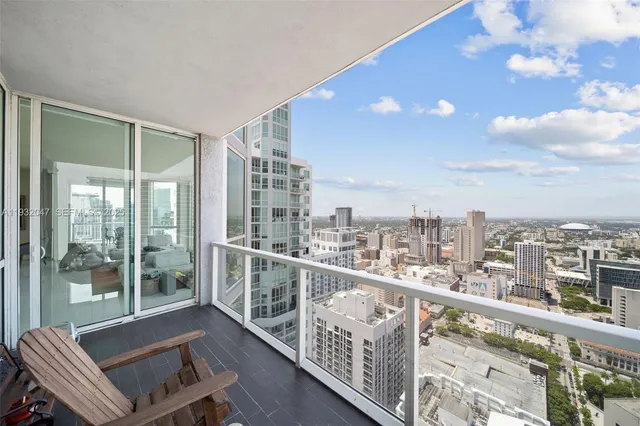 a view of a balcony with city view