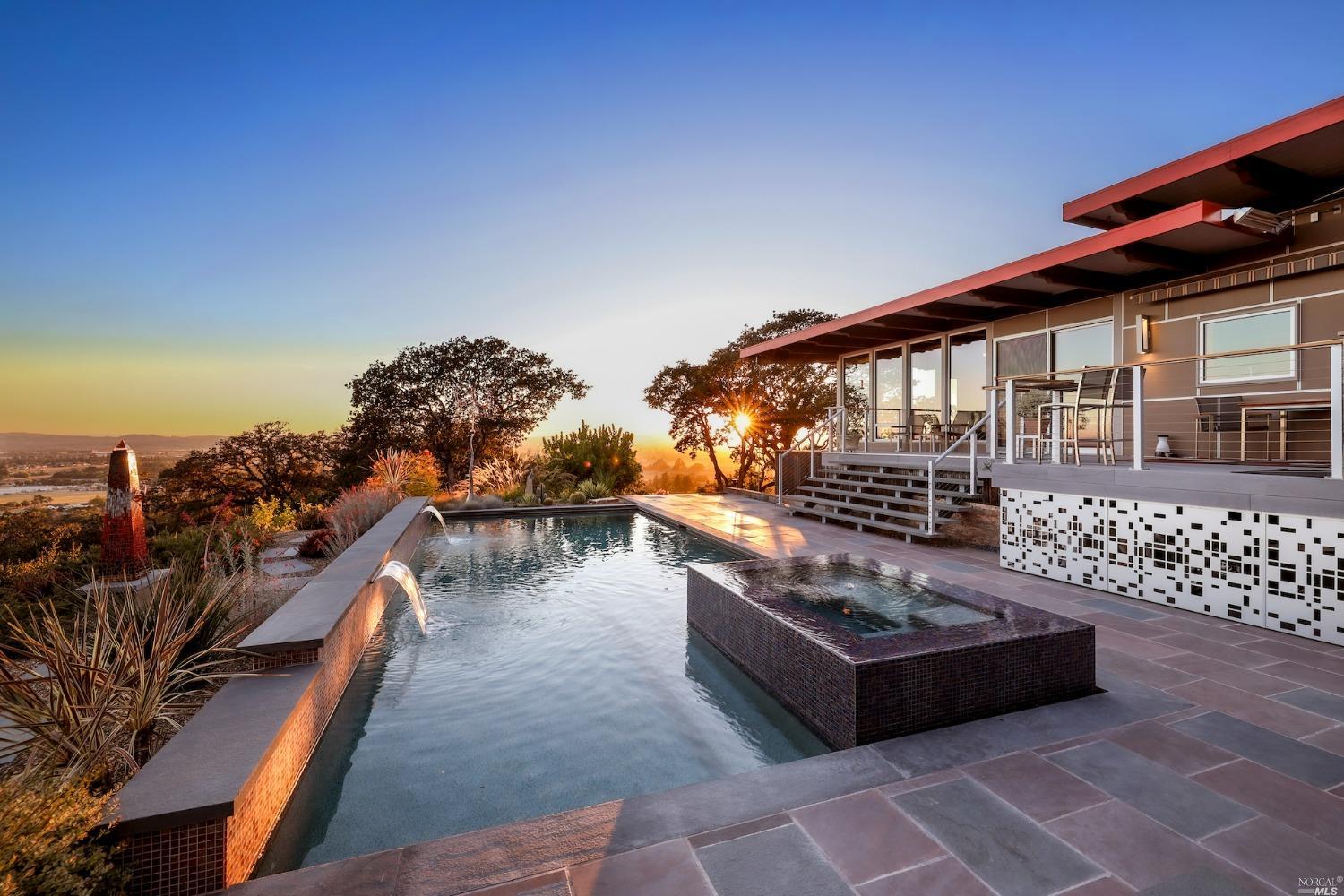 a balcony with furniture and city view