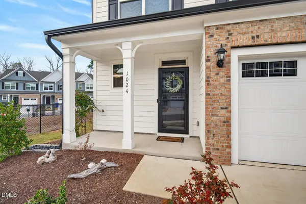 a front view of a house with a porch