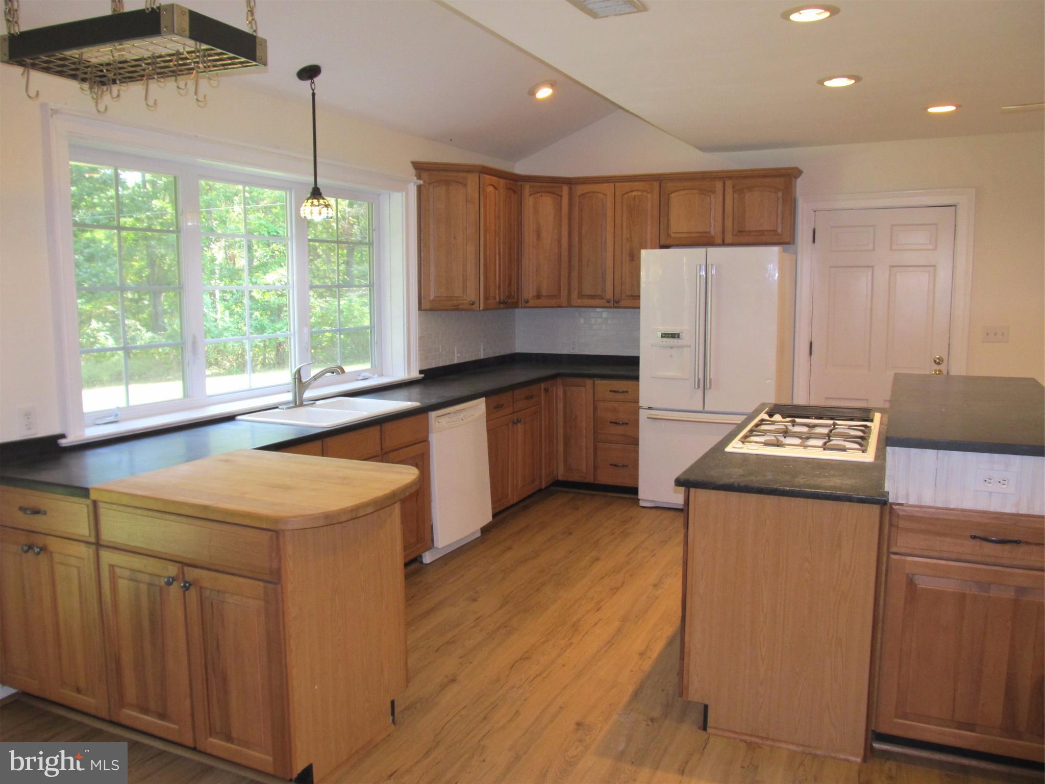 5679 Senseny Road Berryville, VA 22611 - Photo 13 of 30 Large windows overlook the green backyard.