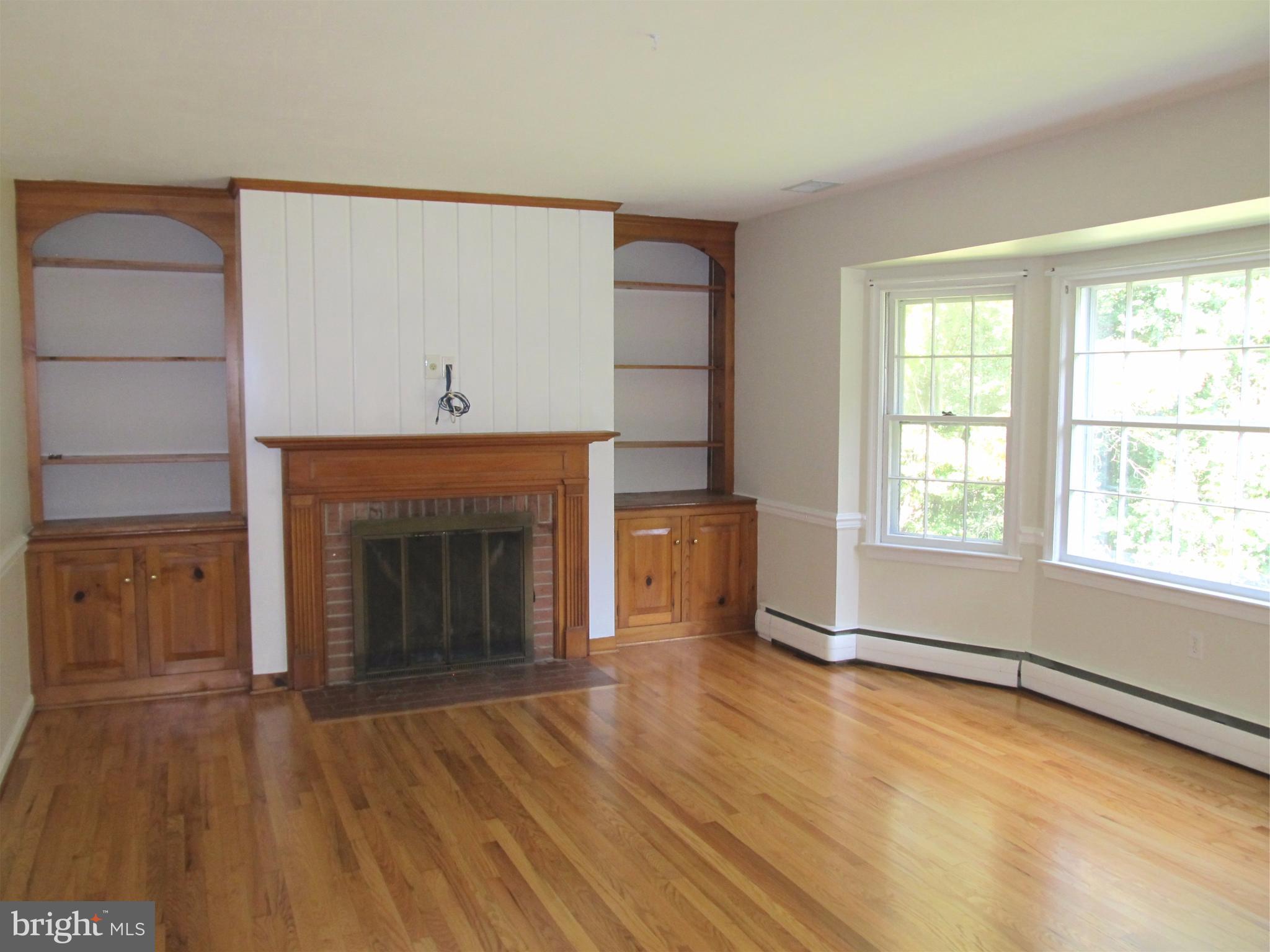 5679 Senseny Road Berryville, VA 22611 - Photo 15 of 30 Cozy family room with built in shelves.