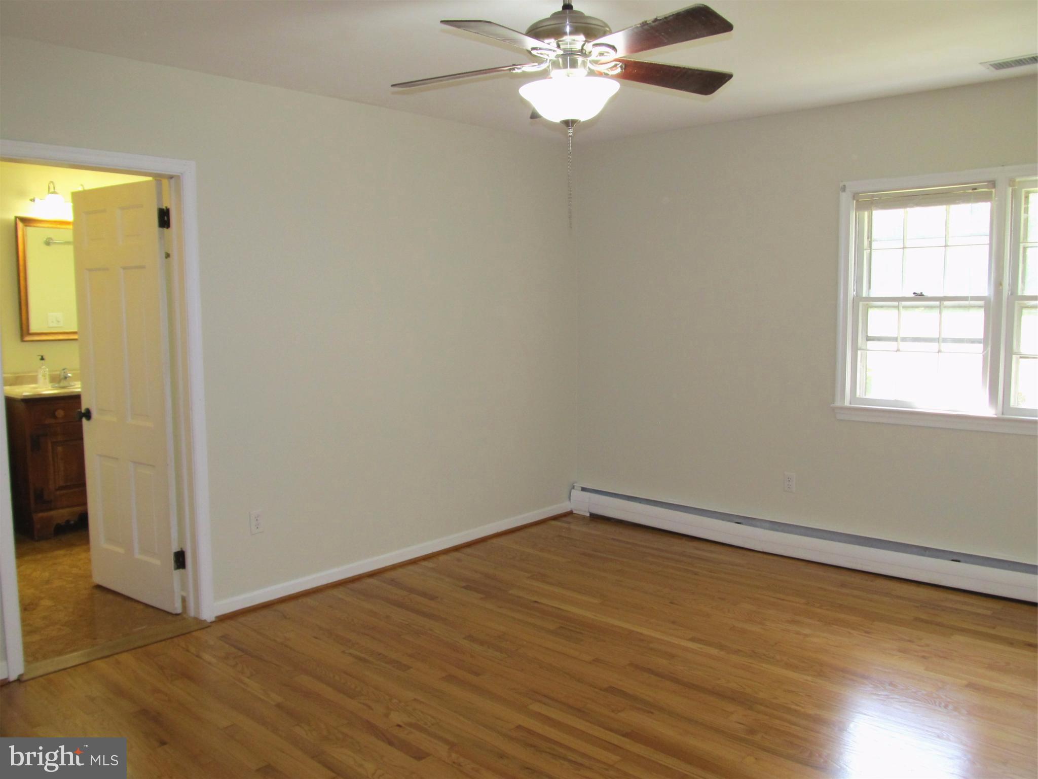 5679 Senseny Road Berryville, VA 22611 - Photo 16 of 30 Master bedroom with refinished wood floors