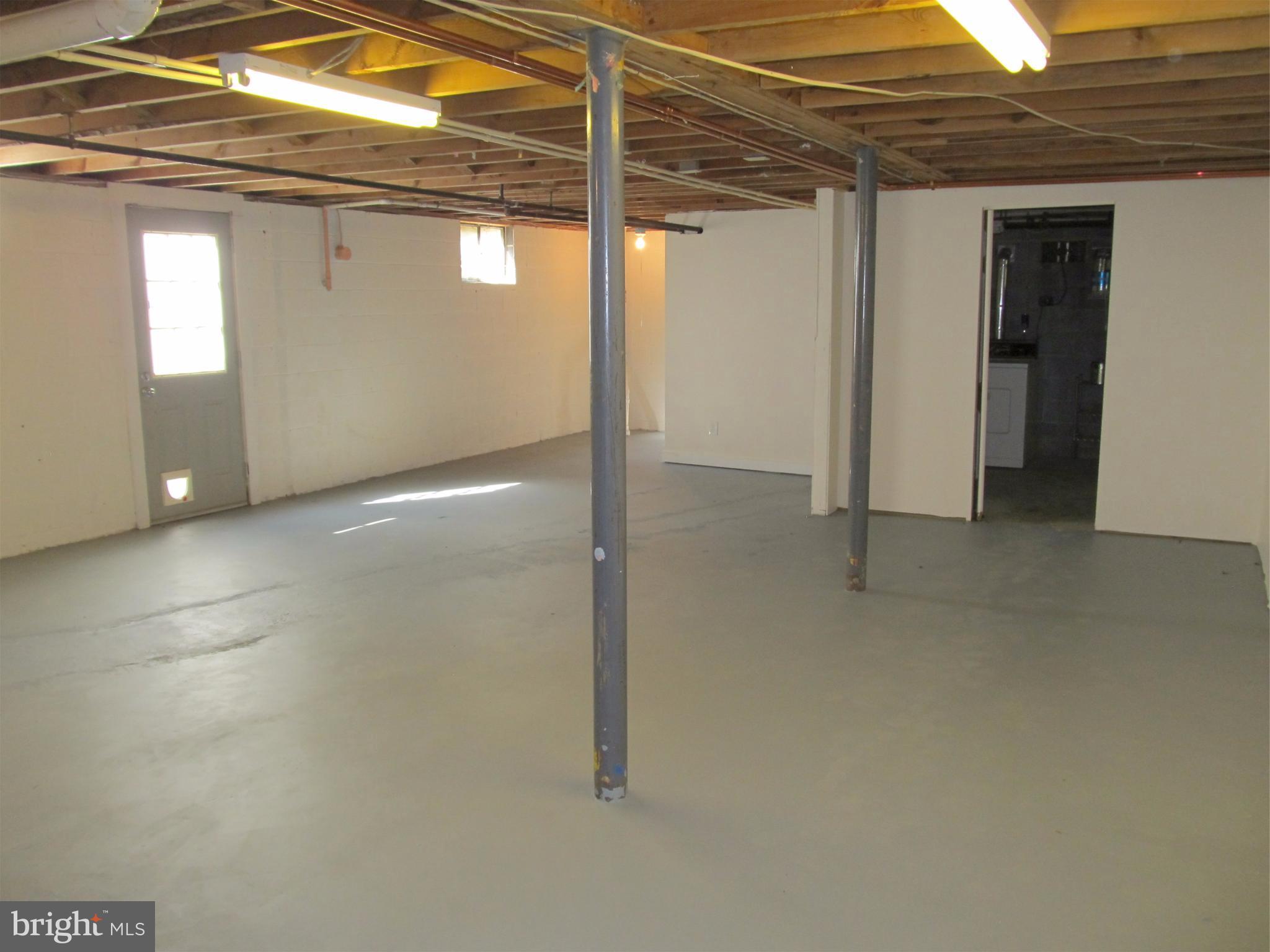 5679 Senseny Road Berryville, VA 22611 - Photo 24 of 30 Freshly painted flooring and walls in basement.