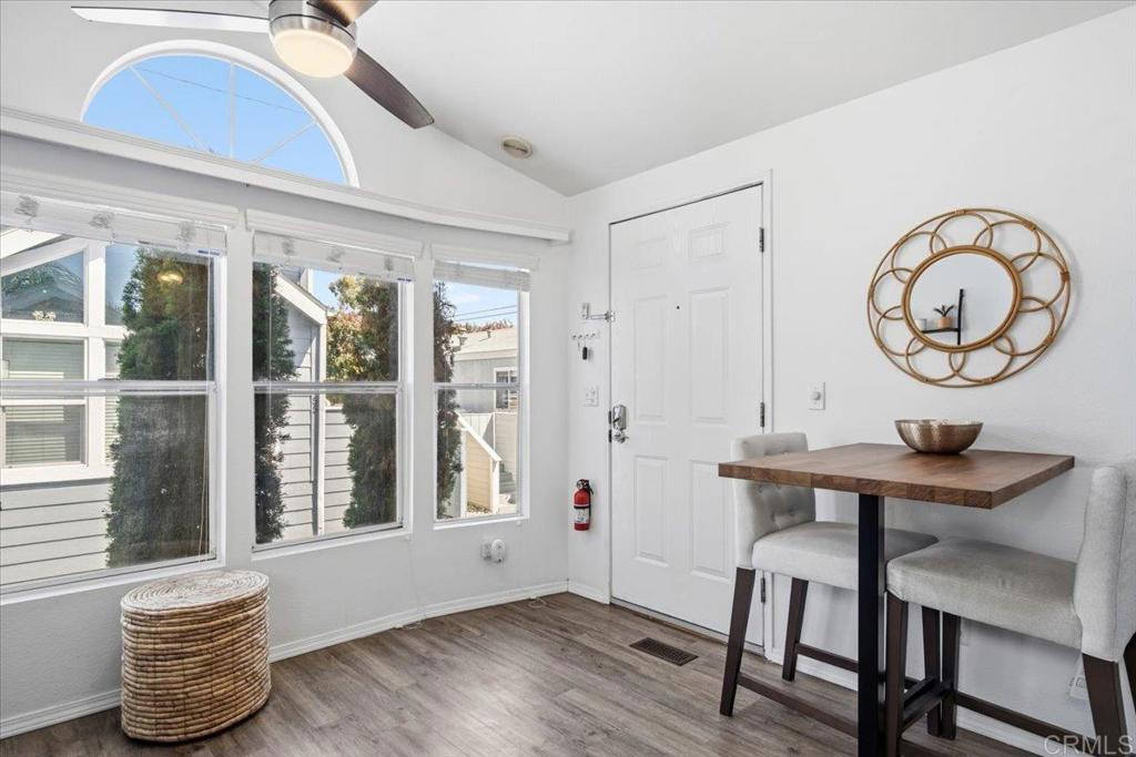 1624 North Coast Highway 101, Unit 6 Encinitas, CA 92024 - Photo 8 of 26 a view of room with furniture and wooden floor