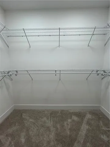 a bathroom with a sink toilet a mirror and bathtub